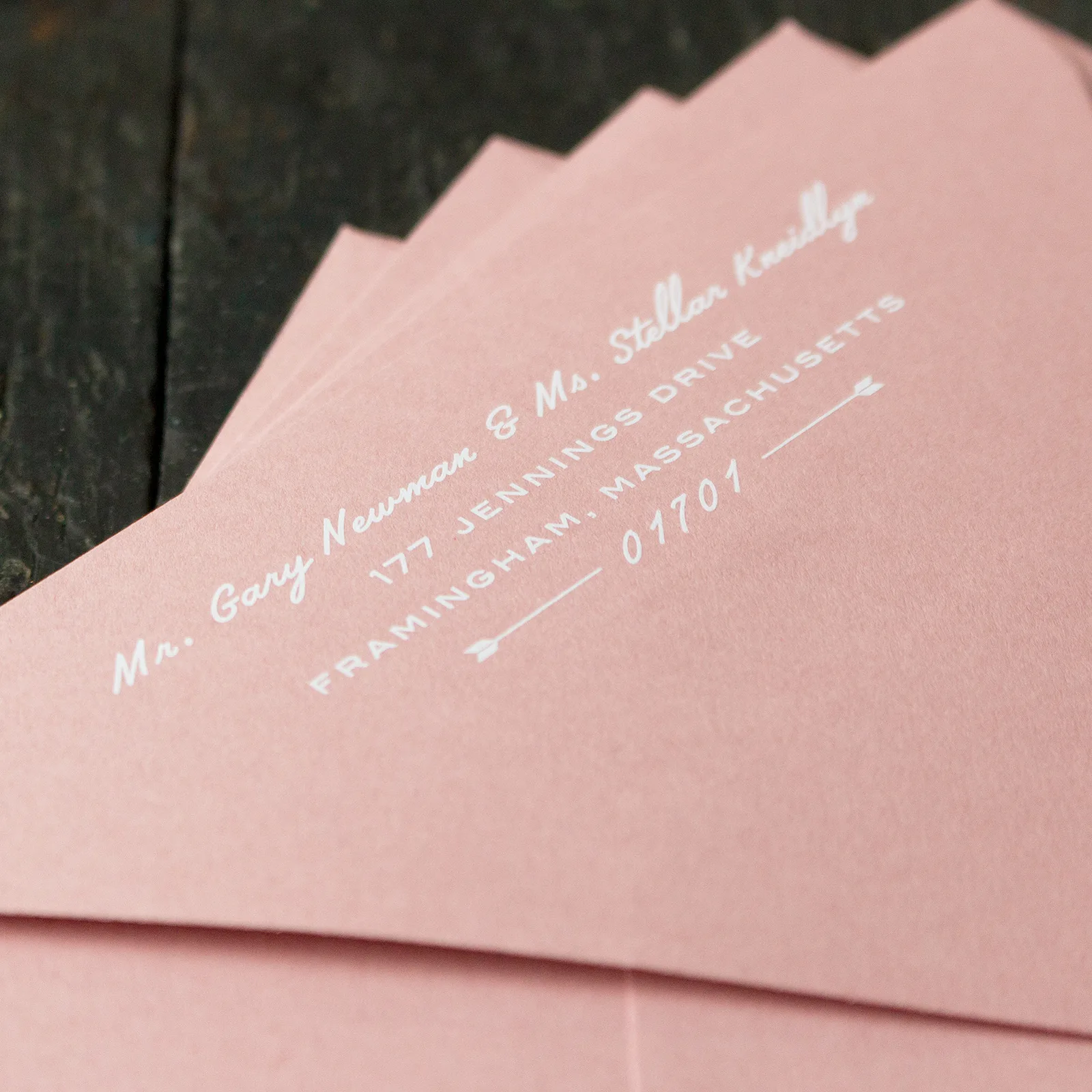 White ink digital printing on a colored envelope