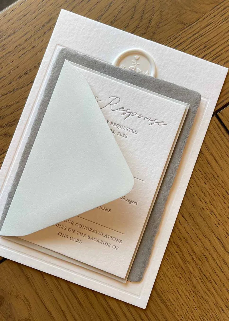 Handmade paper letterpress wedding invitation