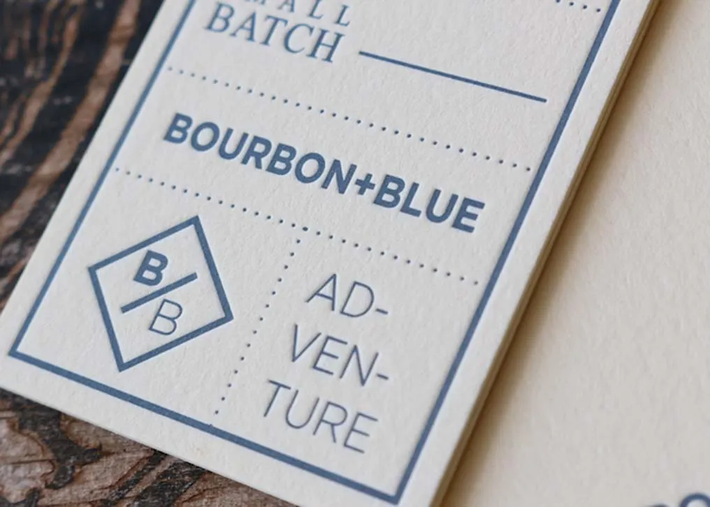 Detail of drilled hole and string attachment on double-thick letterpress hang tag