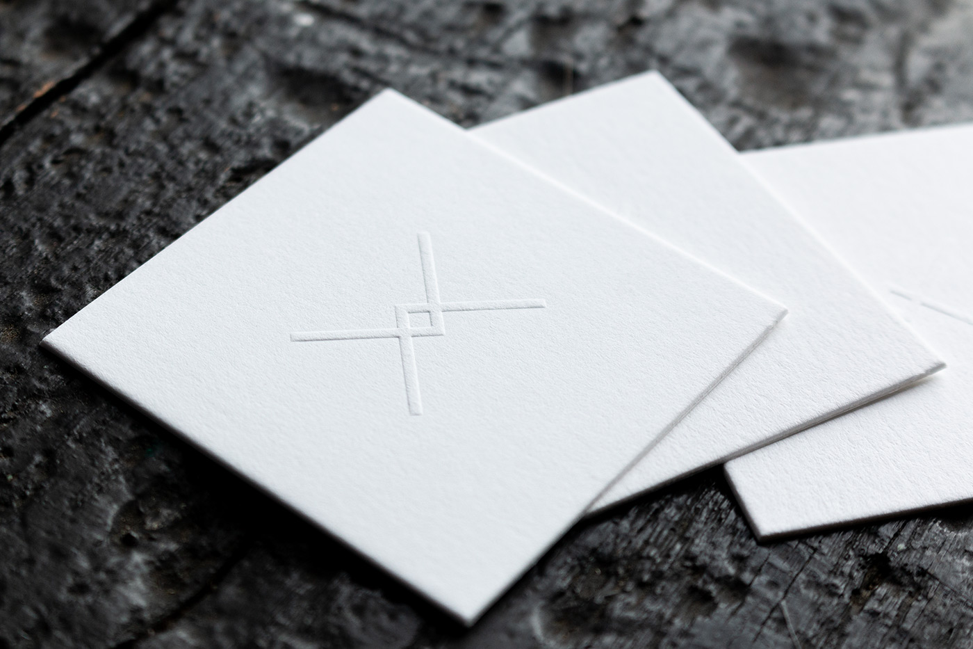 Blind embossed square business card