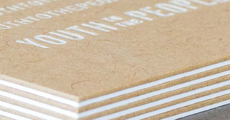 White foil on kraft paper duplexed to white paper business card